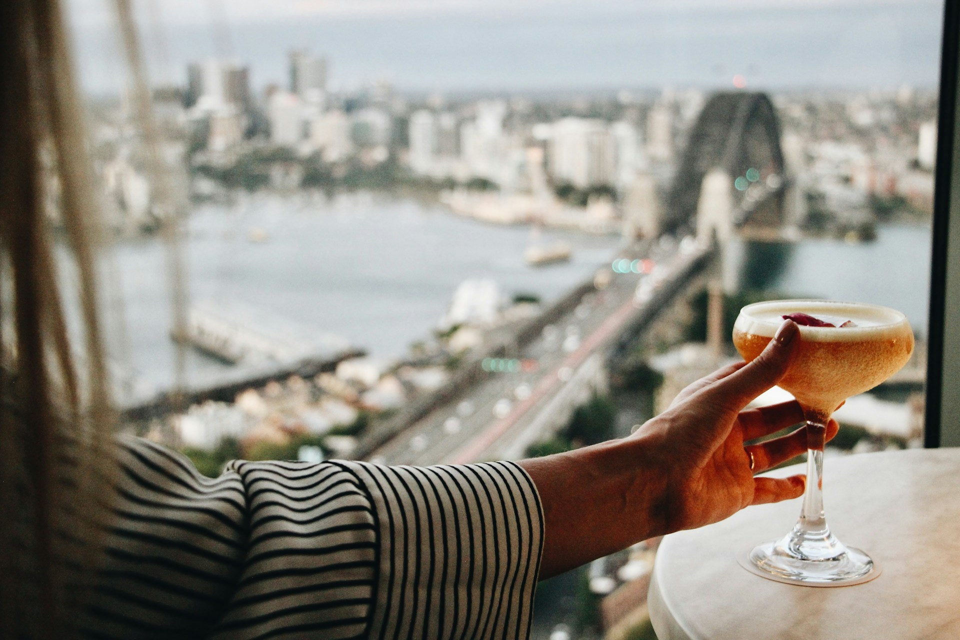 Aerial view of vineyards with a dining table set
